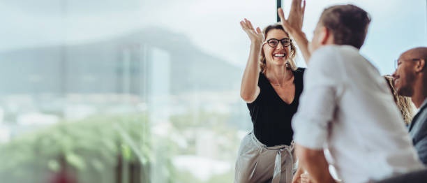 person celebrating success, reaching goals, happy and fulfilled
