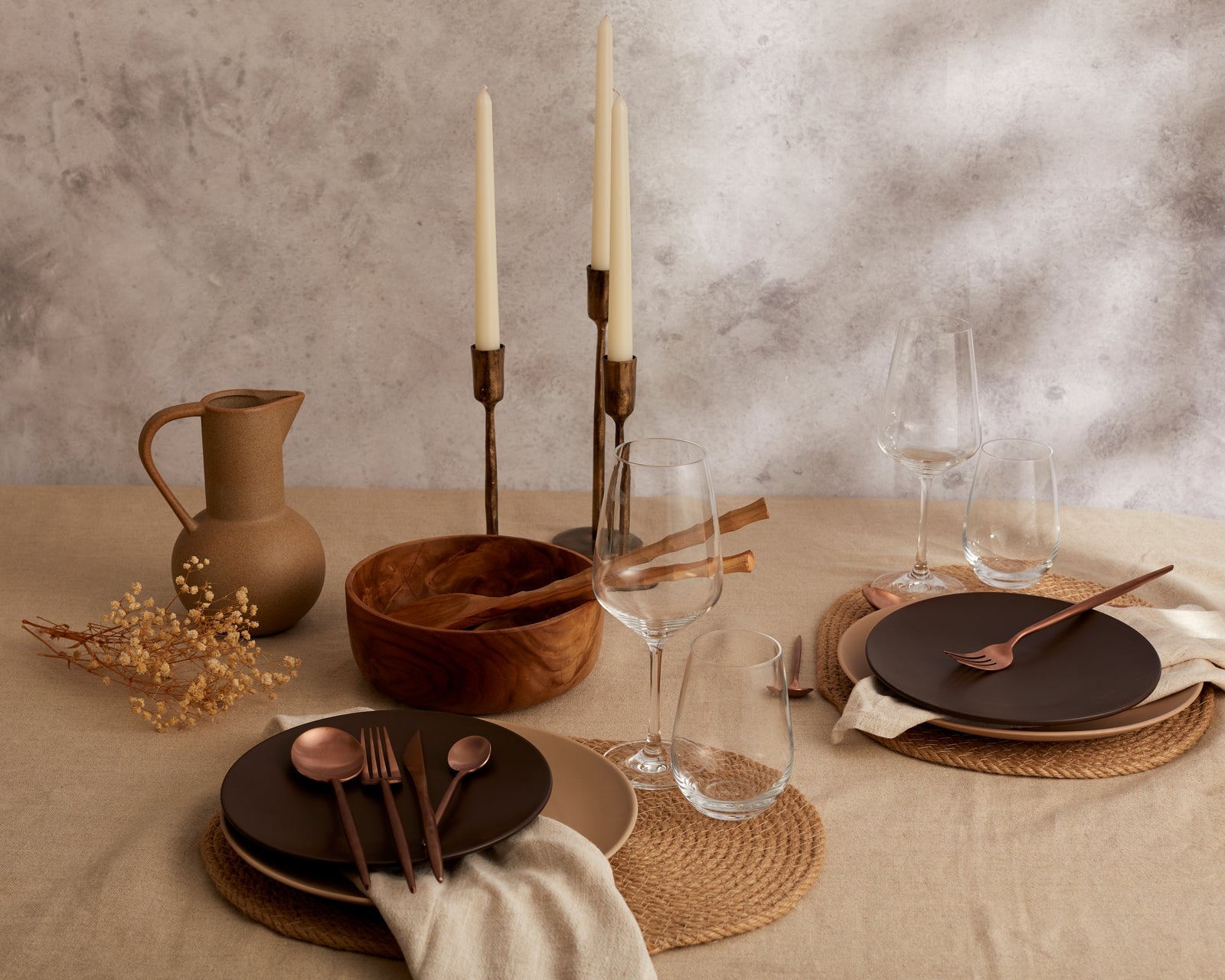 wooden table, ceramic bowl, linen napkin, warm lighting