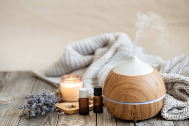 soy candle, essential oils, diffuser, cozy atmosphere