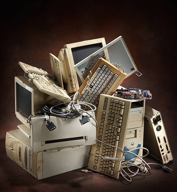 old computer, dusty, legacy code, frustrated developer