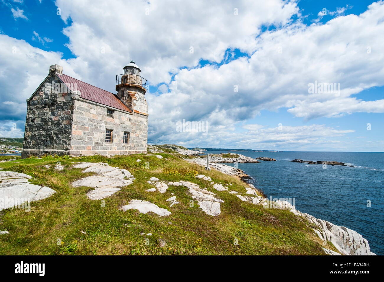 lighthouse,french coast,calm sea,stone building