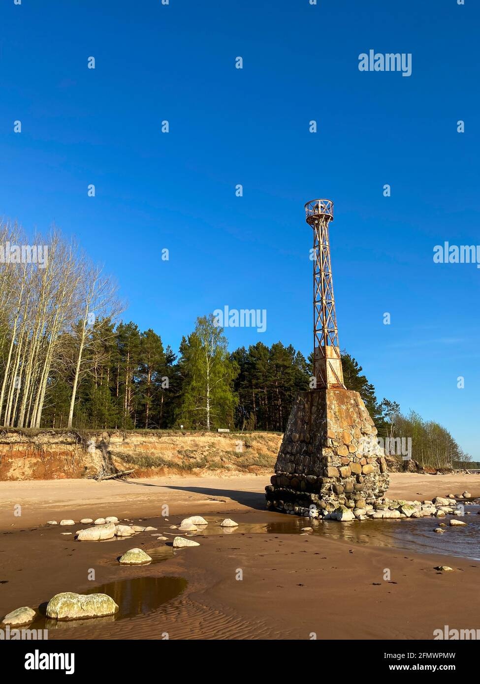 lighthouse,rusted metal,weathered paint,historical details