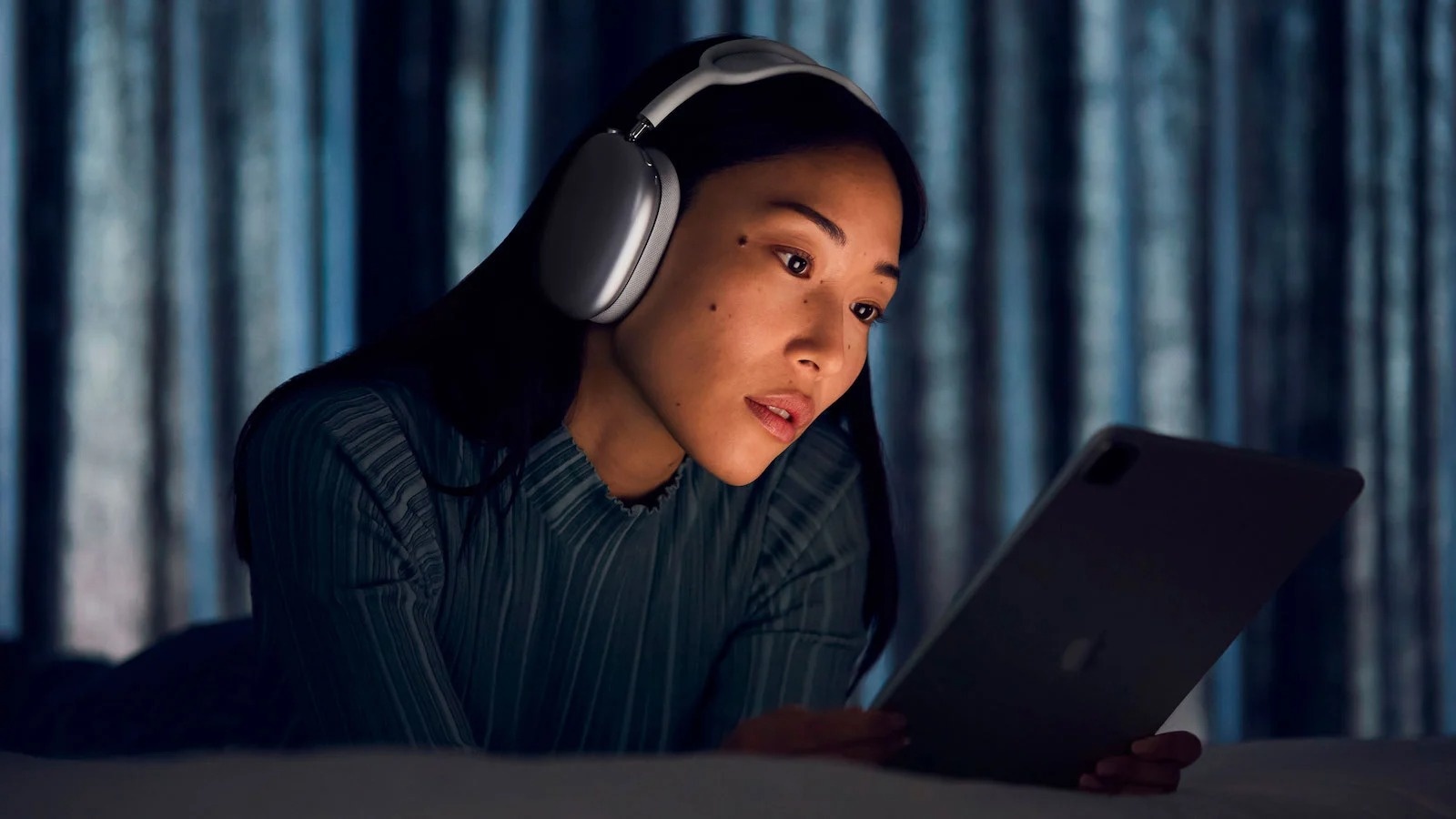 person wearing headphones experiencing spatial audio visualization