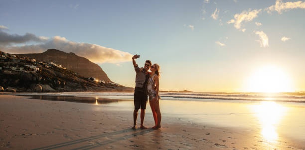 couple,romantic,beach,sunset