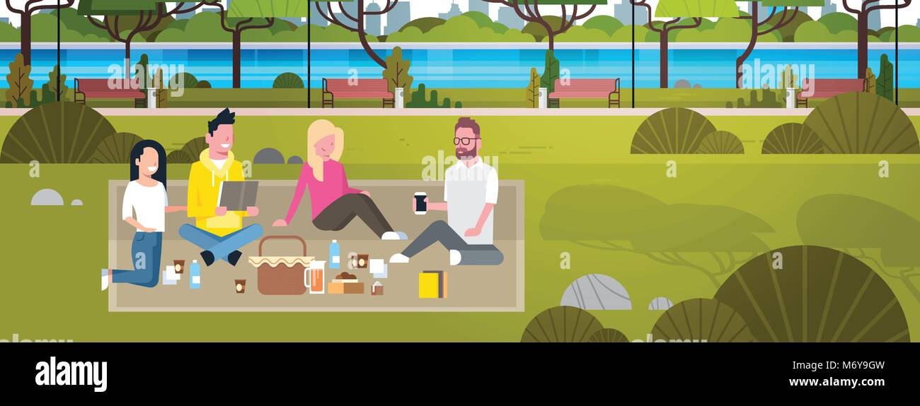 group of people relaxing in park, smiling