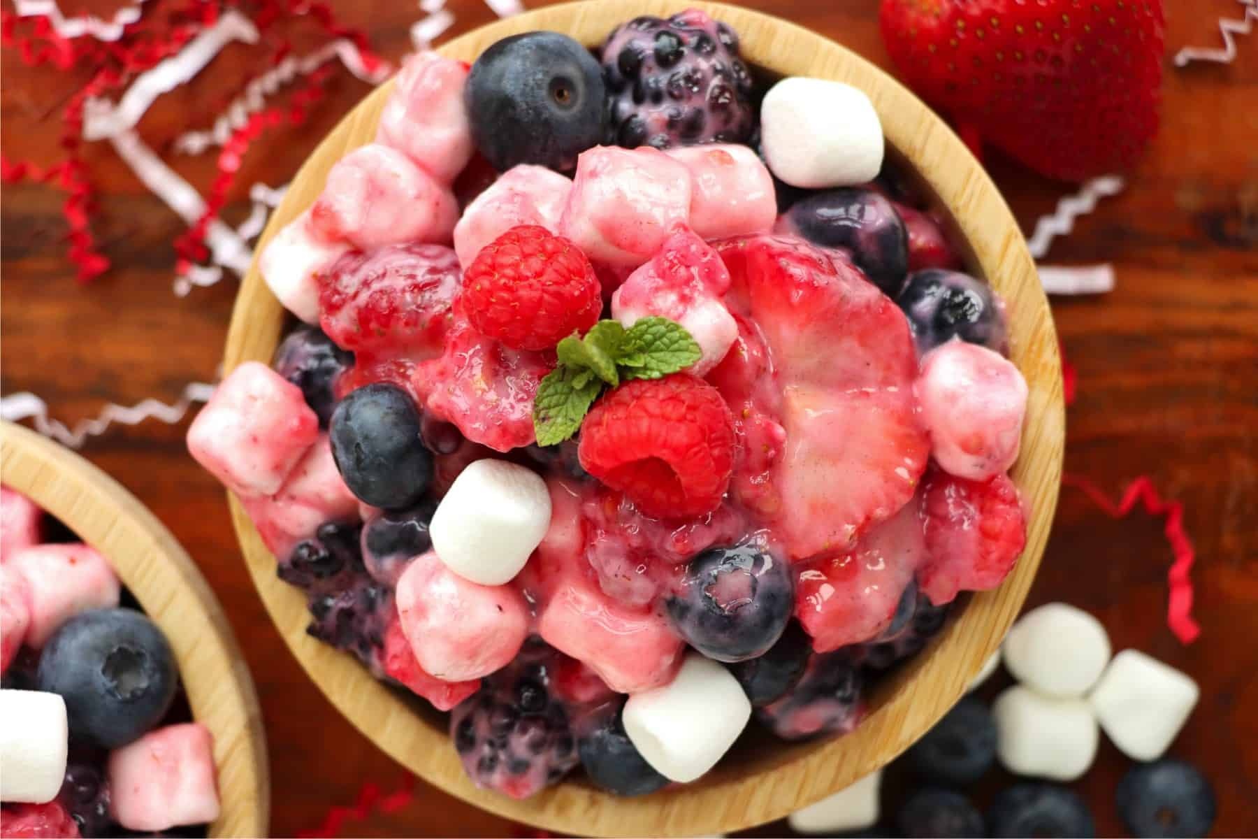 homemade healthy snacks: fruit salad, nuts, yogurt with berries