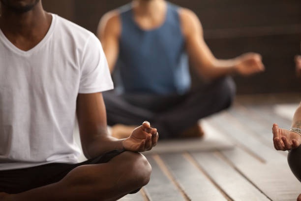 person meditating, close up, focus, calm