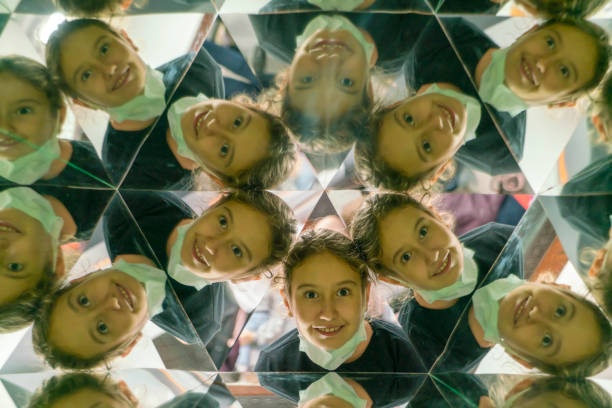 person looking through kaleidoscope, different perspectives, vibrant colors