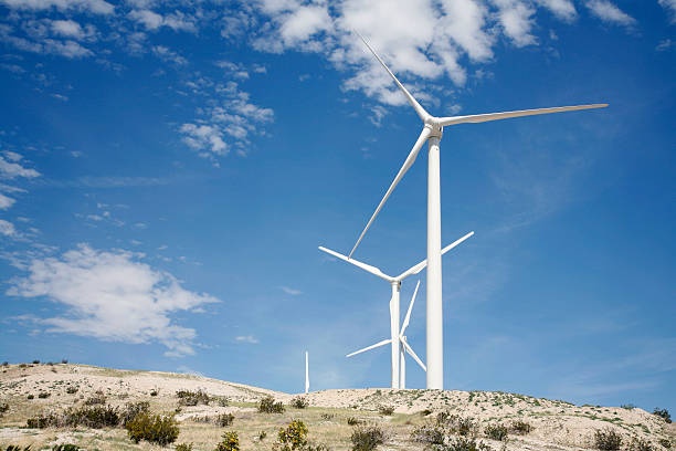solar_panels_desert,wind_turbines,clouds
