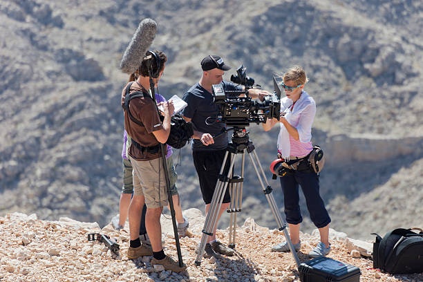 film production set, director, camera crew