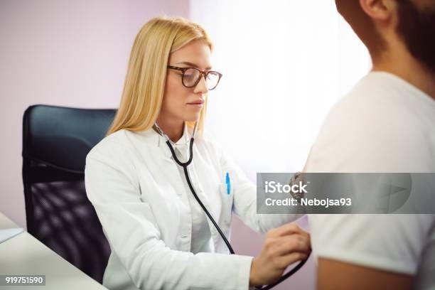 doctor examining patient, stethoscope