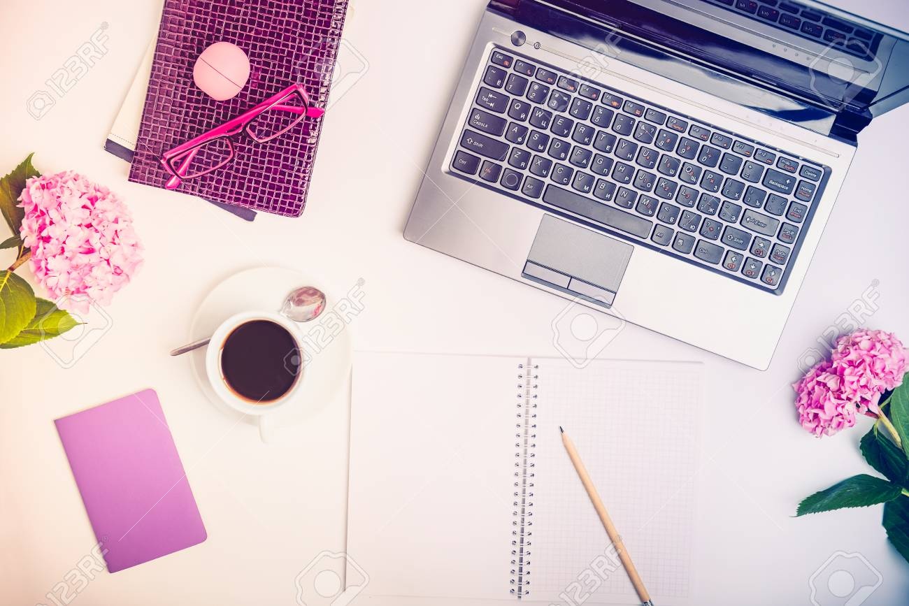 creative workspace, desk, laptop, sketchbook, coffee, inspiration