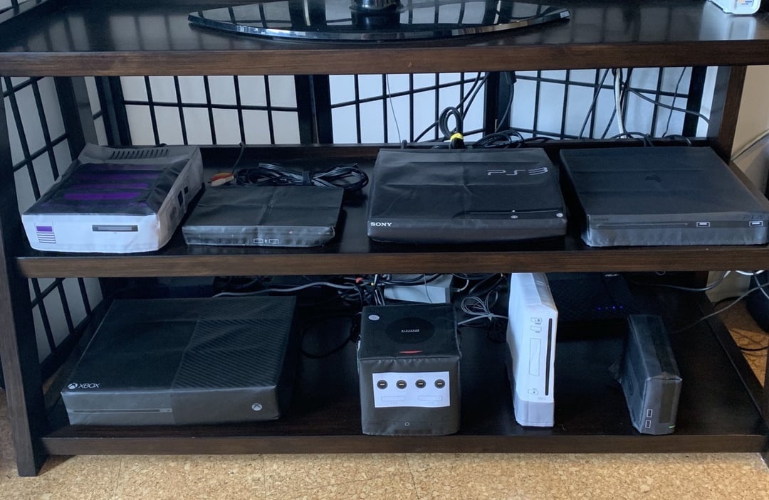 gaming console, open case, dust inside