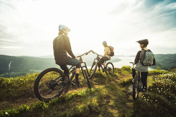 bicycle,group,landscape,mountains