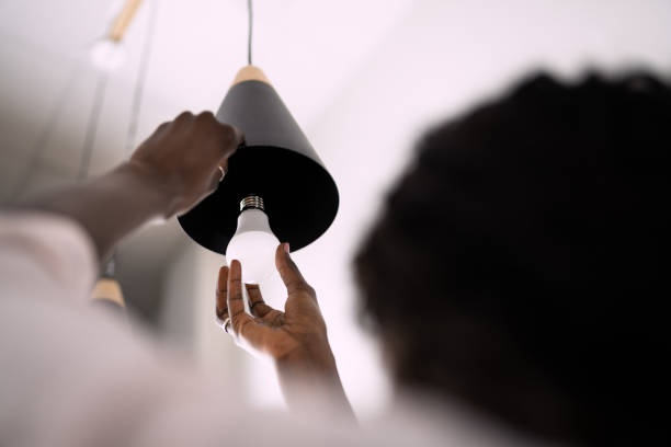 woman,kitchen,energy saving,light bulbs