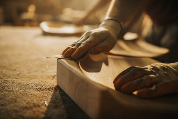 person working on a craft project, hands, close-up