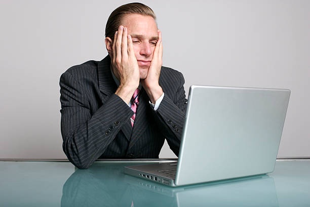 person,stressed,laptop,desk