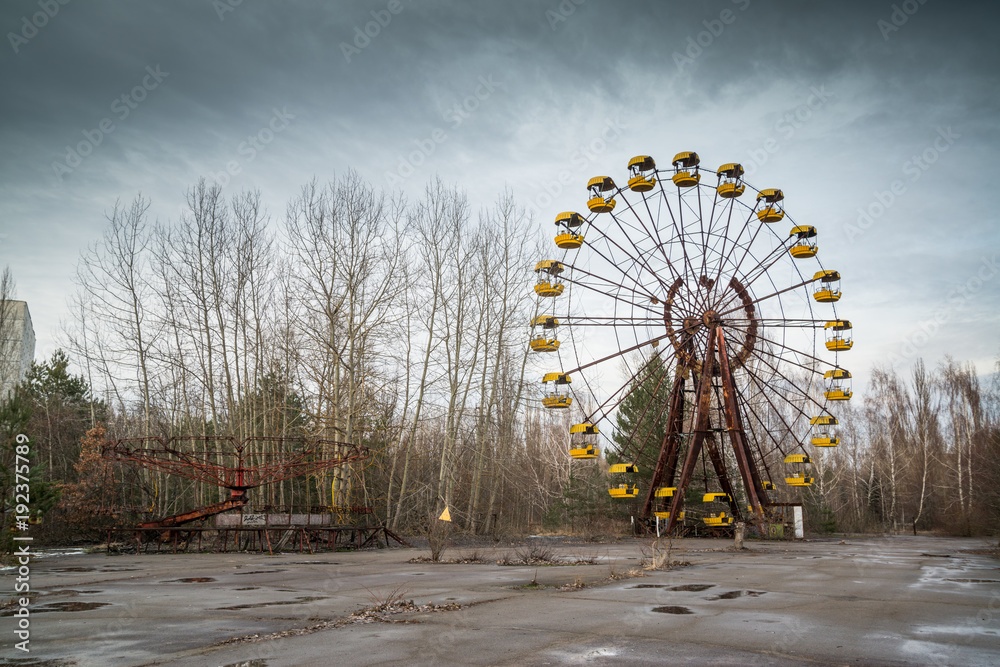 Chernobyl Exclusion Zone, overgrown buildings, abandoned Ferris wheel