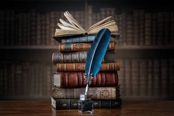 old book, manuscript, quill, ink
