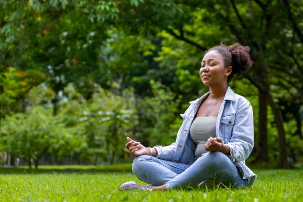 woman meditating, calm, peaceful