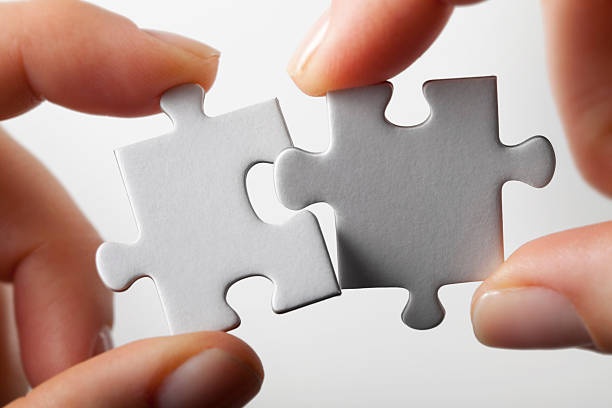 puzzle pieces fitting together, abstract, teamwork