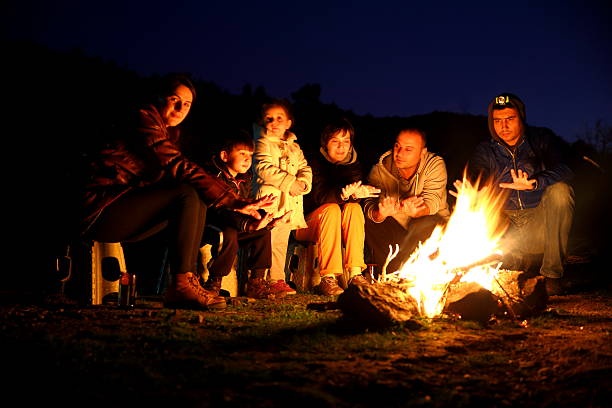 storytelling, campfire, people listening