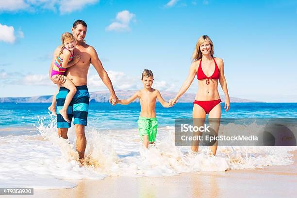 family,laughing,playing,beach