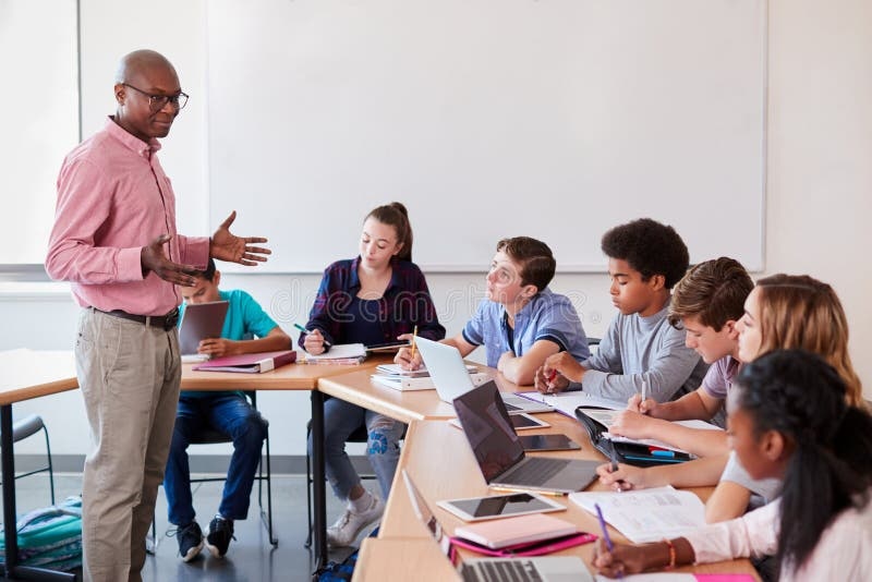 modern classroom,students,teacher,technology