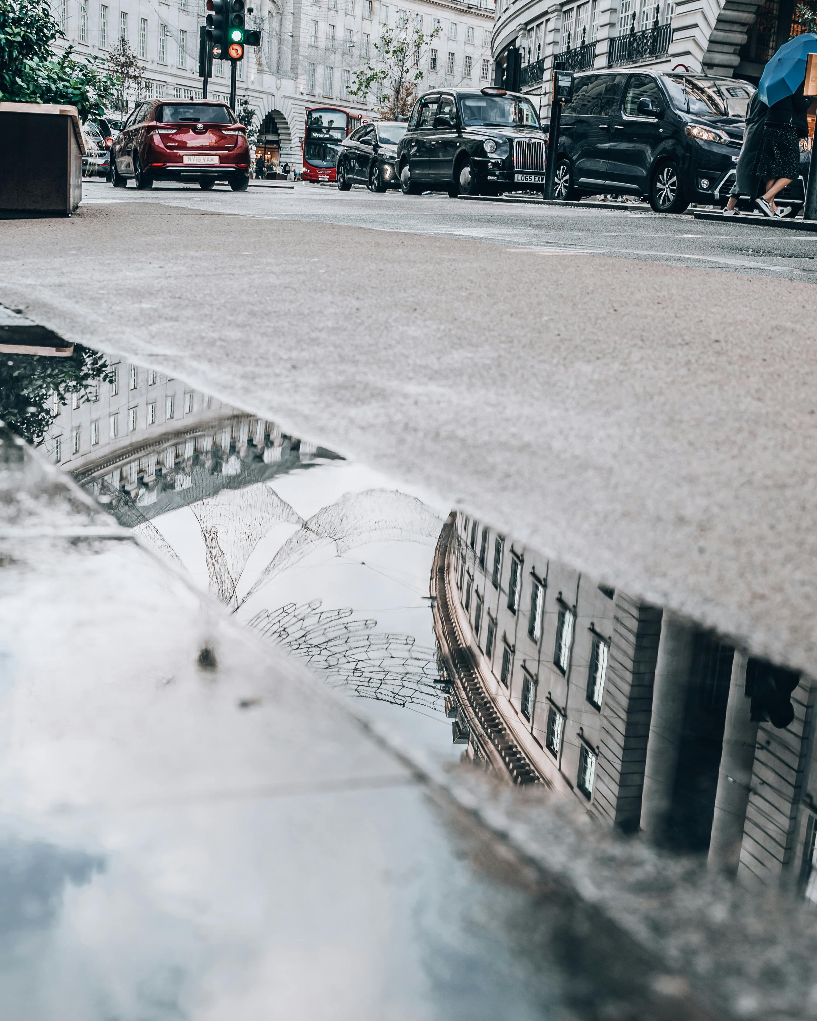 rain,puddle,city,reflection