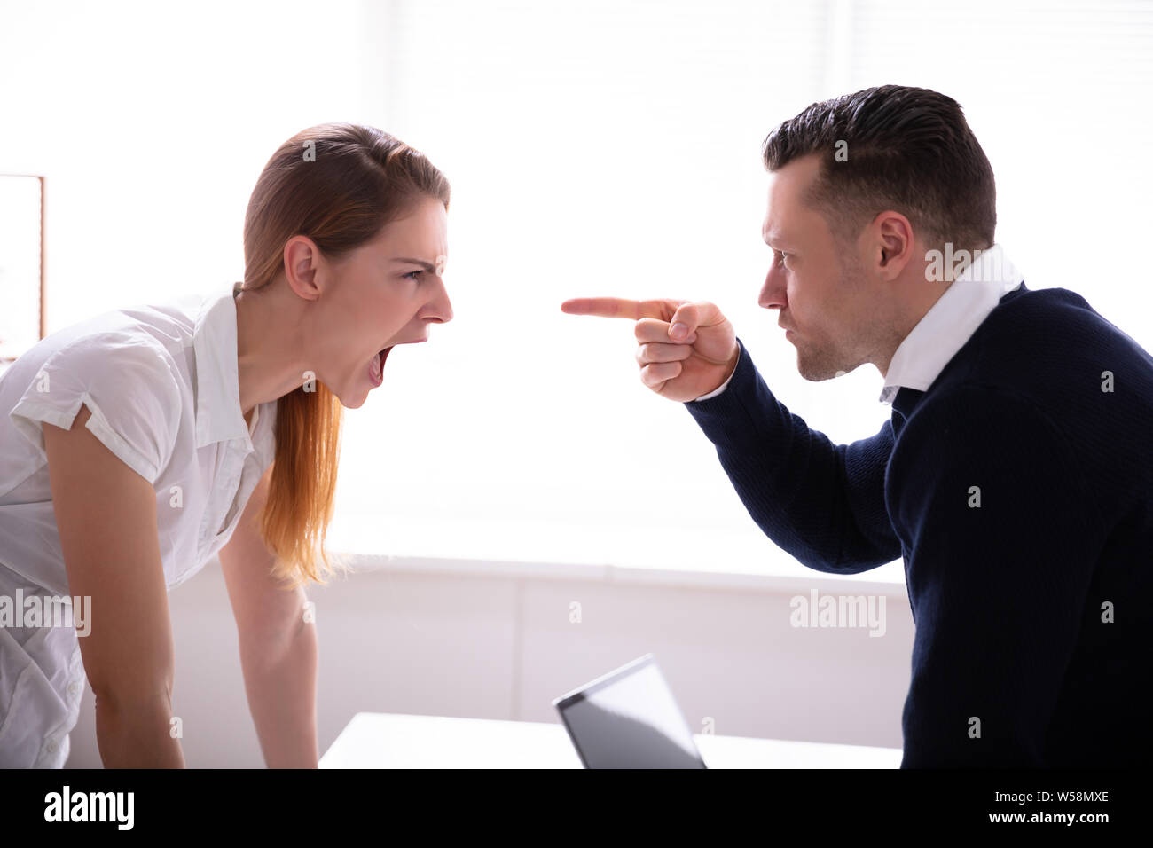two people,pointing,argument,conflict