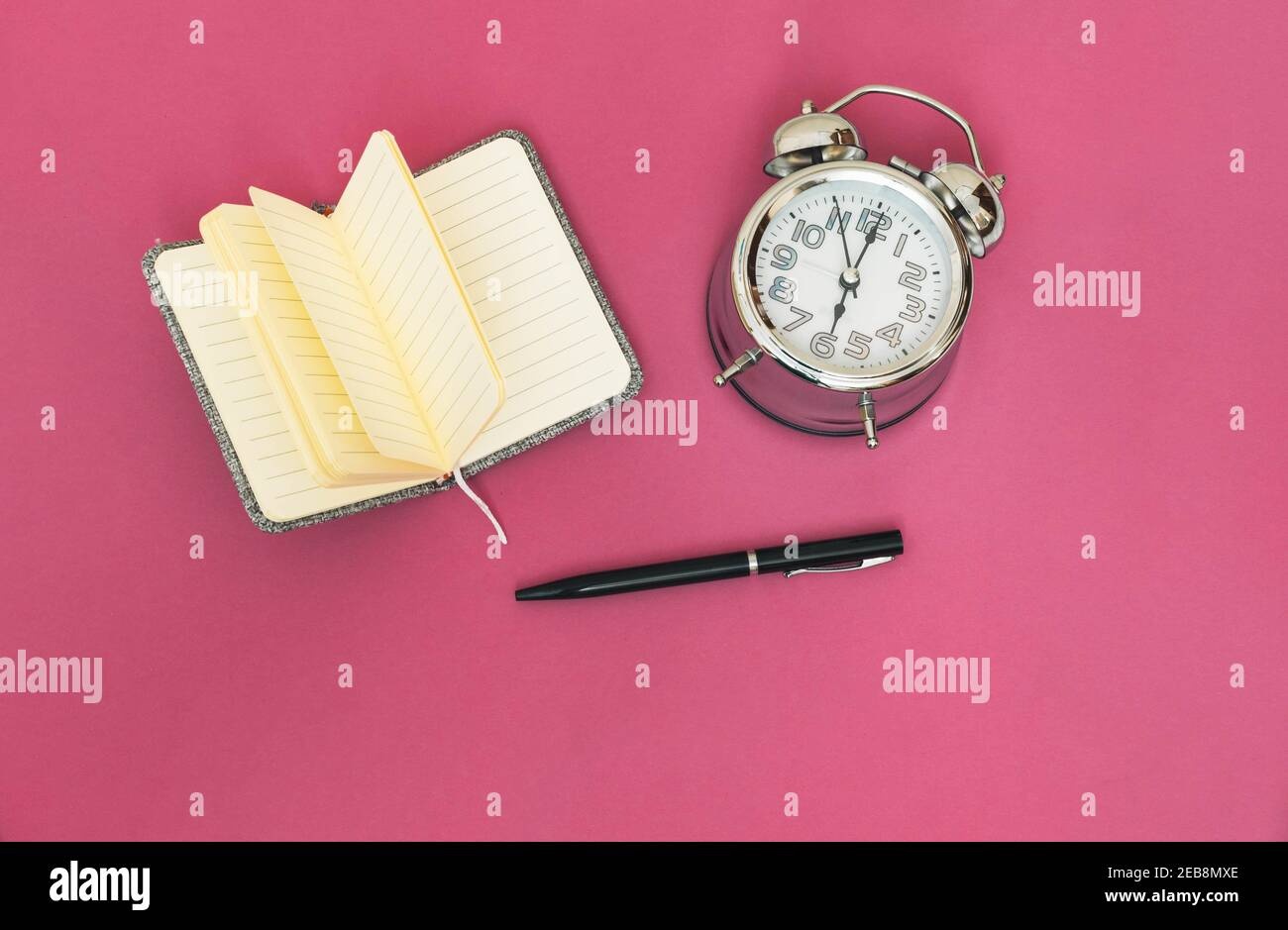 notebook,pen,clock,woman