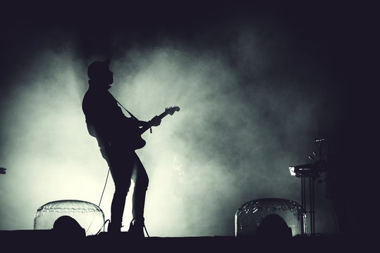 guitar,player,stage,lights