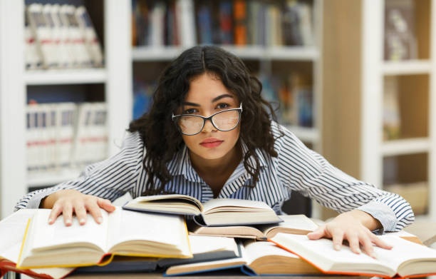 student,stressed,books,desk