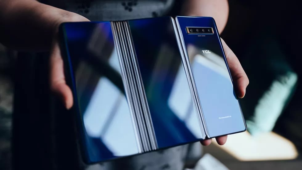 foldable smartphone,hands,technology,modern