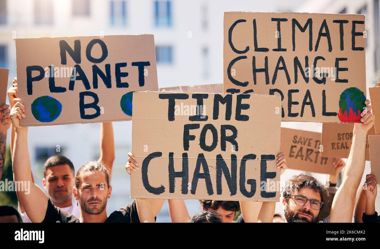 group of people holding signs, protest, activism, social change