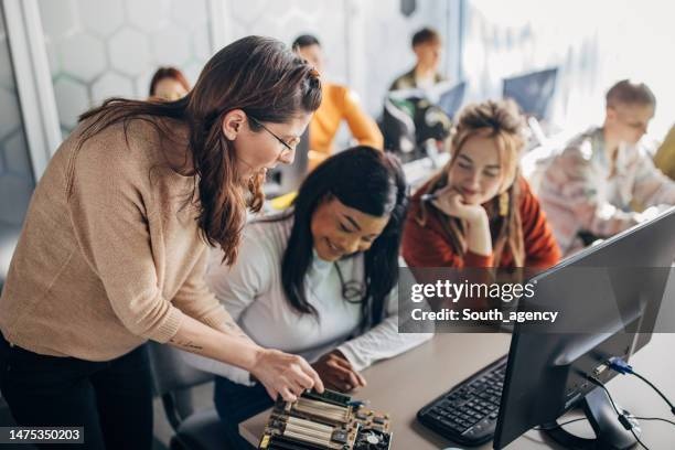 person,teaching,group,laptop