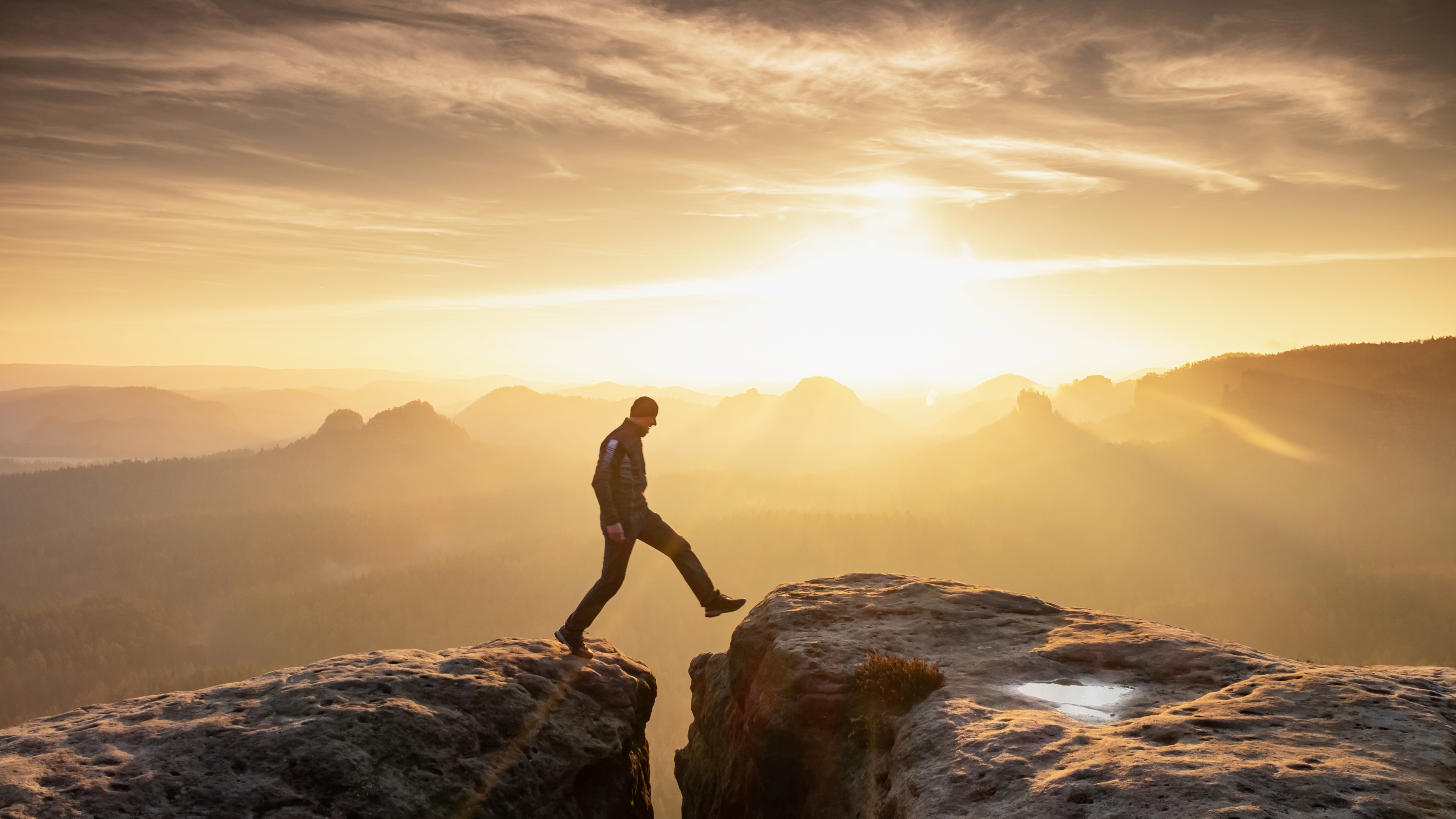 person stepping out of comfort zone, challenging, growth, overcoming obstacles