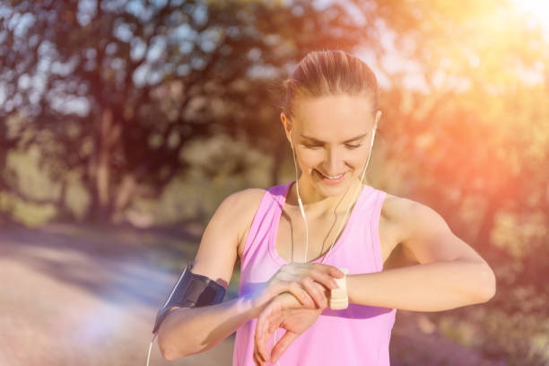 athlete running with headphones