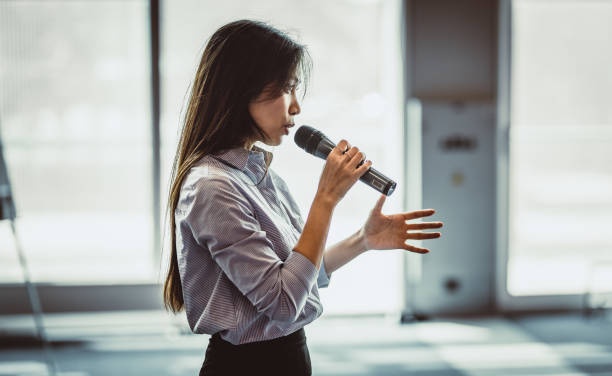 microphone,woman,speaking,confident