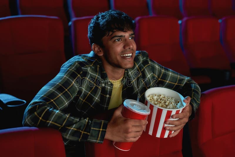 audience, popcorn, movie theater, smiling