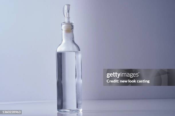 white vinegar,glass bottle,kitchen