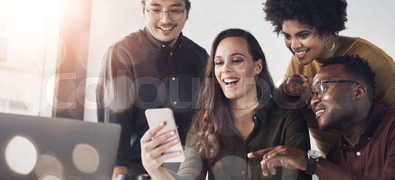 group of people laughing at phone screen, internet meme
