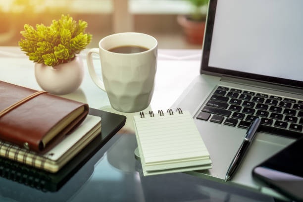 student, desk, books, laptop, coffee