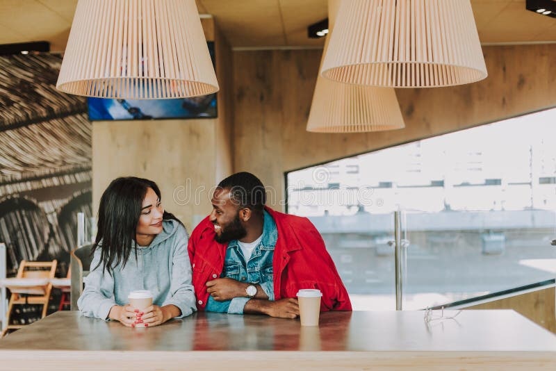 couple,talking,cafe,happy