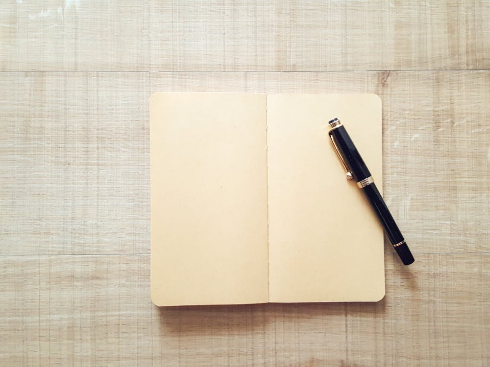 notebook,pen,writing,reflection
