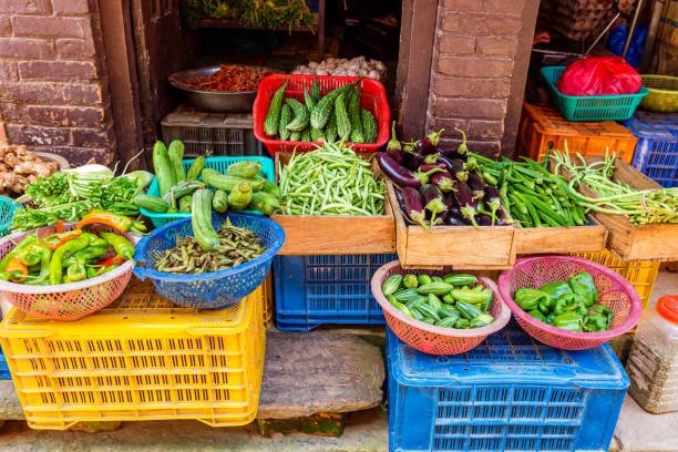 baskets of fresh vegetables, market stall, colorful, summer